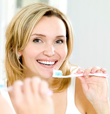 Woman Brushing Teeth