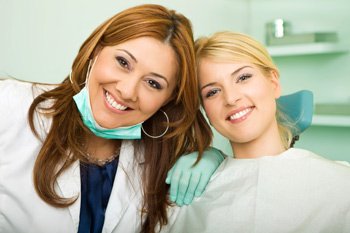 Woman Smiling with Dentist